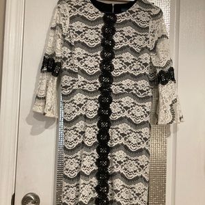 Black and white lace dress with 3/4 bell sleeves, Size 8P, back zip